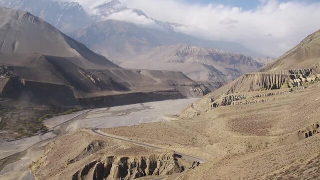 Wide view of the arid Kali Gandaki valley and braided riverbed near Kagbeni, Upper Mustang, Nepal