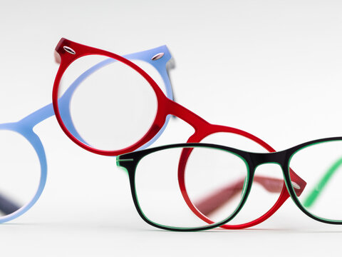 Close-Up of Overlapping Colorful Plastic Eyeglasses