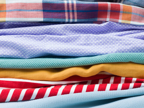 Horizontal Close-Up of Neatly Stacked Colorful Fabrics
