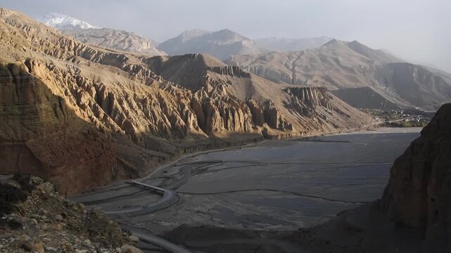Canyon of the Kali Gandaki seen from Chele towards Chhusang, braided riverbed and arid cliffs, Upper Mustang, Nepal