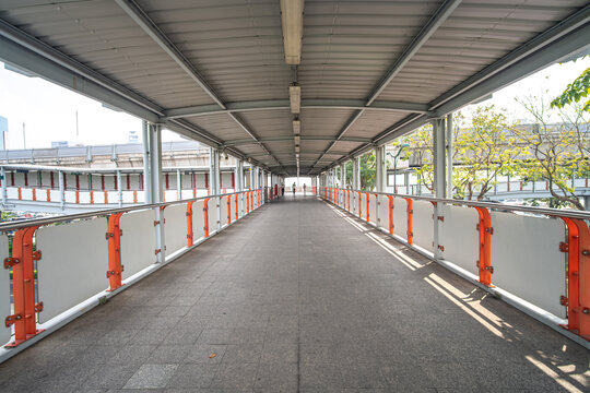 The road to the bts skytrain railway station metropolistic mass transport