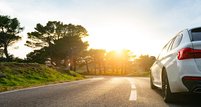 Mediterranean sea coast road into mountains horizon in summer with beautiful bright sun rays