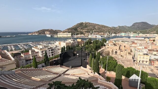 Sweeping panorama over Cartagena, its old town, marina and industrial port ringed by hills, Murcia, Spain