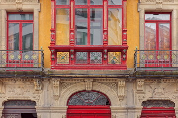 Highly ornate facade, orange-yellow and red, of an eclectic style house from the early XX c.on Calle Párroco Camino Street. Luarca-Asturias-Spain-021 © rweisswald