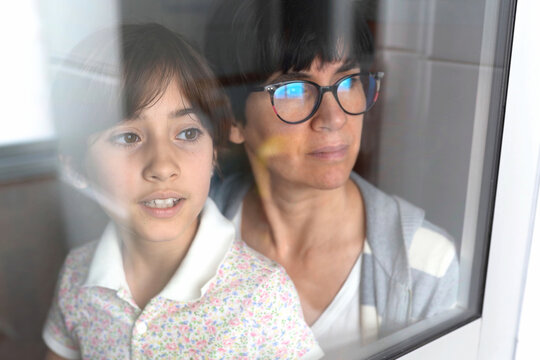 Mother and daughter sharing hope. Quiet family conversation highlighting love and future dreams