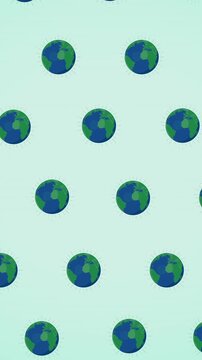 Animation of multiple falling globes on green background