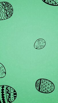 Animation of easter eggs falling on green background