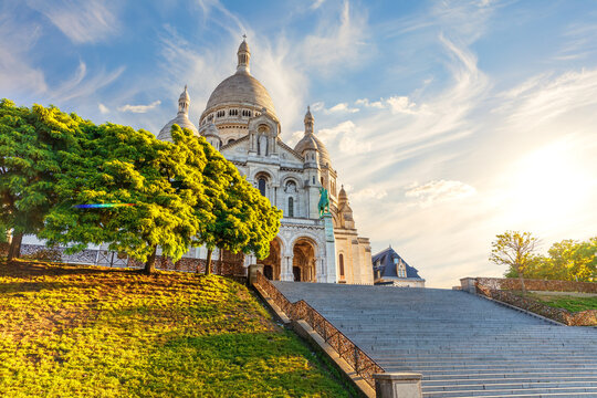 Sacred Heart Basilica in Montmartre in warm golden sunset light with no people, Paris, France
