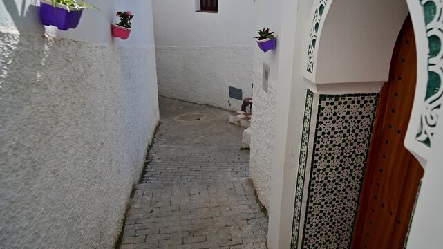 Walking in an alley toward Ibn Battuta's tomb in Tangier, Morocco