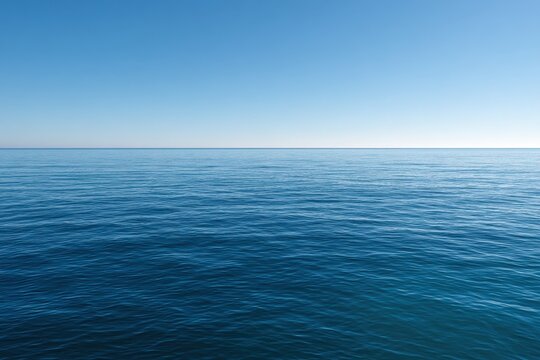 Serene ocean scene with smooth blue gradients and a distant horizon