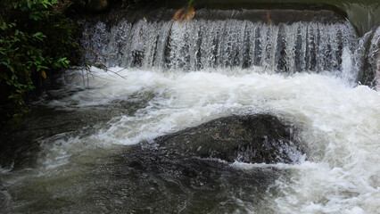 A shallow stream rushing over the rock © Reji VR