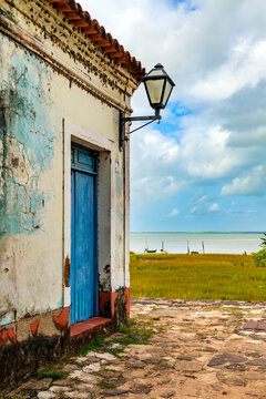 A colonial house deteriorated by time, facing the sea in the historic city of Alcantara in Maranhao.