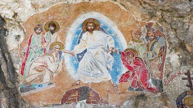 Religious rock mural art at Ostrog Monastery in Montenegro