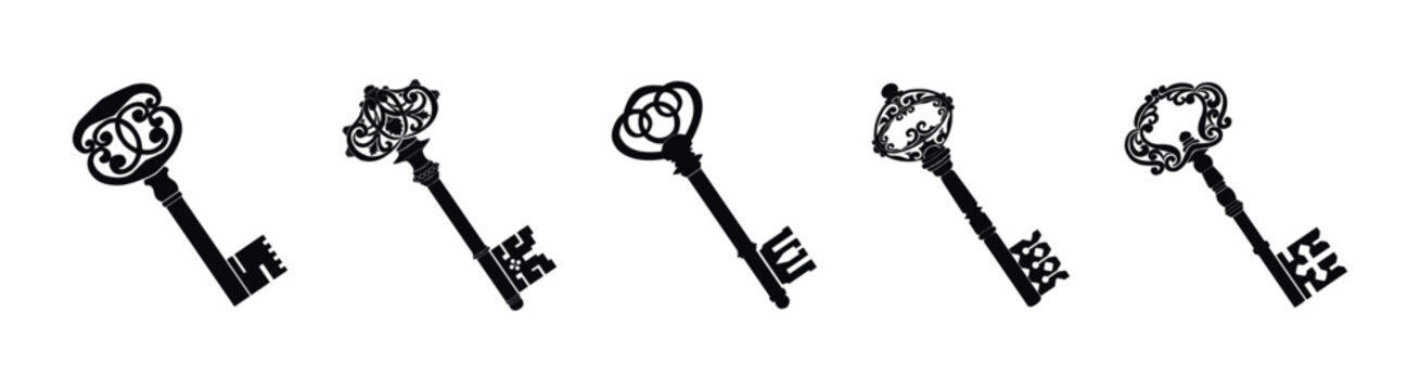 Collection of five ornate vintage skeleton keys with intricate designs
