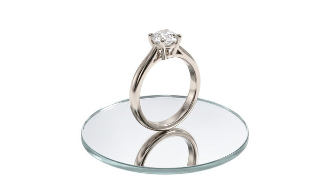 Diamond engagement ring in white gold, luxury solitaire jewelry on mirror surface, elegant bridal wedding ring with brilliant gemstone