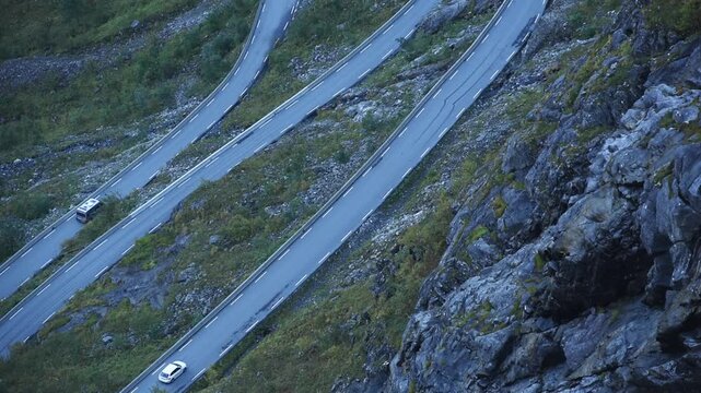 Parallel ribbons of the Trollstigen road threading the steep slope, Route 63, More og Romsdal, Norway