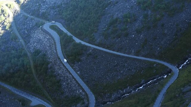 Motorhome on a switchback above scree slopes, Trollstigen, Route 63, More og Romsdal, Norway
