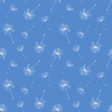 Seamless paper pattern with white hand-drawn dandelions on a blue background