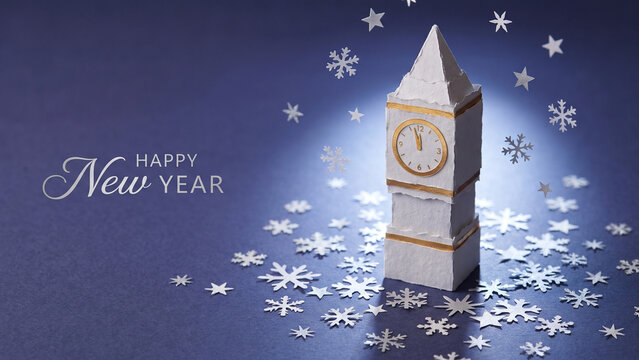 Creative white paper clock tower with snowflakes and stars celebrating a happy new year midnight countdown in London.