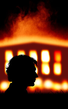 A man seen in profile in silhouette against a backdrop of a burning house. Fire danger, feeling of uneasiness.