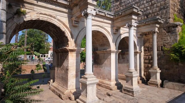 Hadrian Gate, also known as the Uc Kapilar, at the entrance to Antalya Old Town or Kaleici on a sunny day