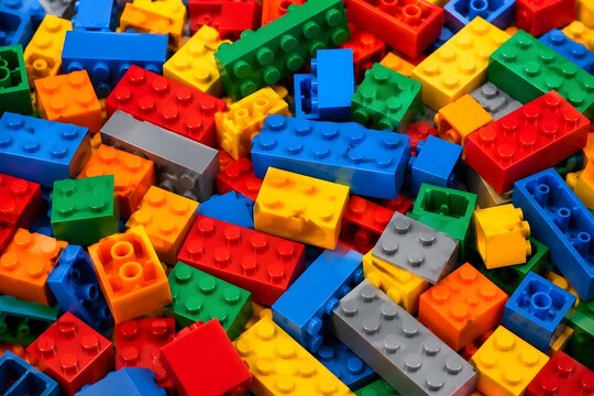 Colorful plastic building blocks scattered together
