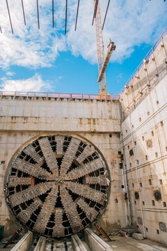 Tunnel boring machine at a USA construction site with crane lifting