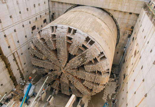 A massive tunnel boring machine prepares for underground drilling