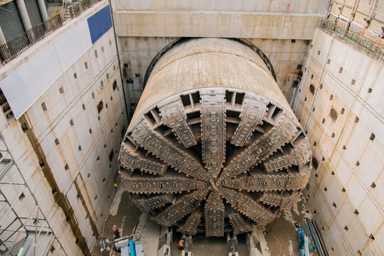 A tunnel boring machine at work inside a vertical construction shaft