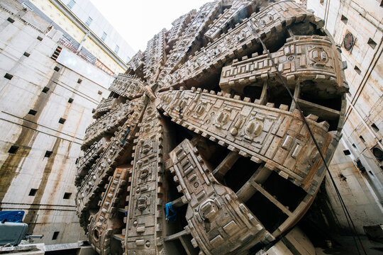 Tunnel boring machine head working in a deep construction shaft