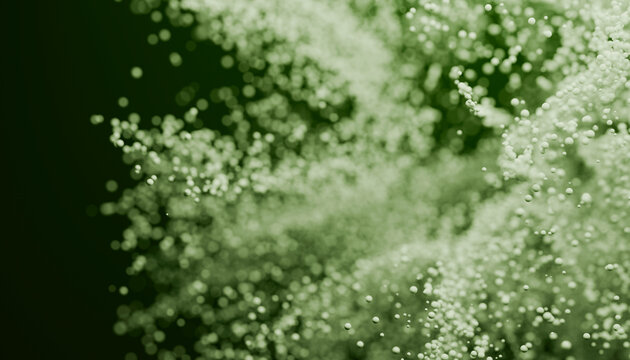 Green floating sphere particles in abstract background
