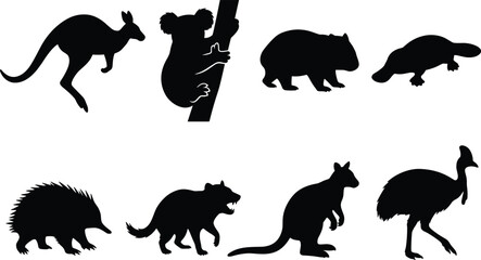 Obraz premium Collection of Australian wildlife silhouettes with kangaroo, koala, wombat, and cassowary isolated on white
