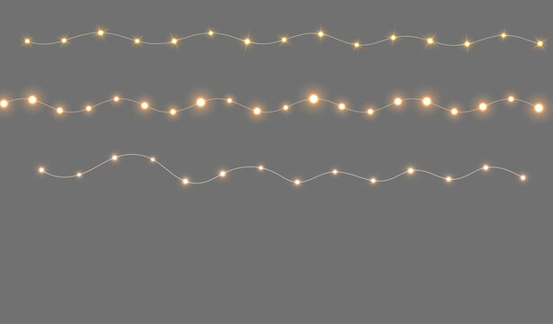 Transparent PNG garland set with warm glowing string lights, sparkling bulbs and soft festive illumination isolated on a transparent background.