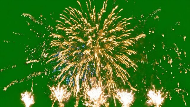 Vibrant fireworks display on green screen, festive golden and blue pyrotechnic bursts for celebration and event compositing