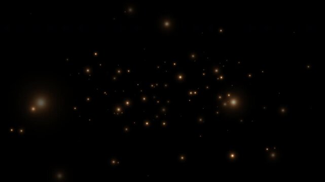Smoothly flying glowing particles on a black background. Golden particles, shimmering light particles, magical golden dust. 4K video.