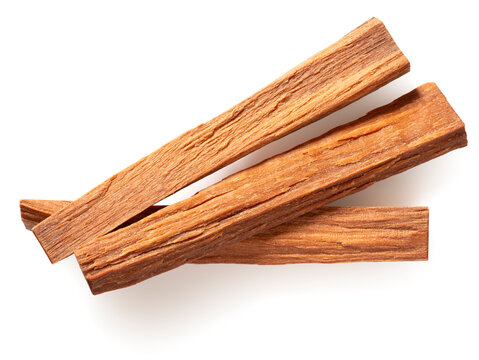 Red sandalwood sticks isolated on white background, top view.
