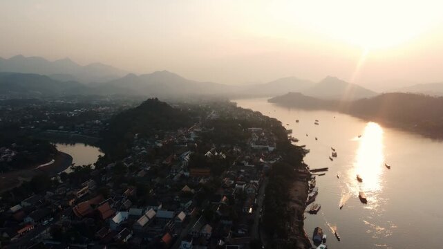 Aerial view Sunset in luang prabang city drone footage.
