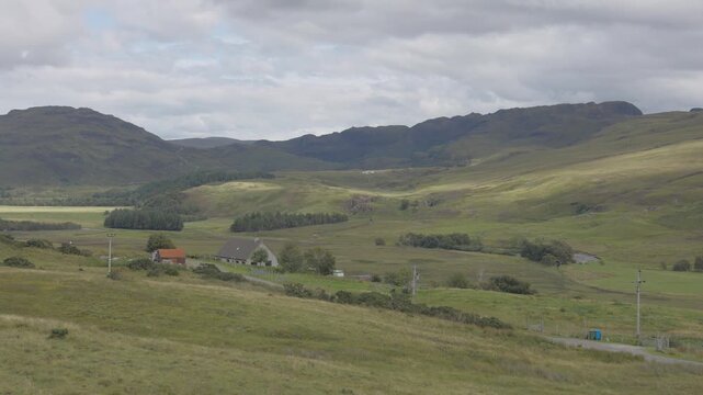 Strathcanaird timelapse  overlooking a beautiful mountainous landscape a little north of Ullapool showing dramatic light/shadow changes.
