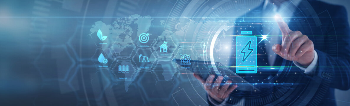 Energy engineer pointing power storage solution. Specialist using tab analyzing battery capacity metric and grid energy storage flow on hologram screen. Sustainable clean energy and storage.