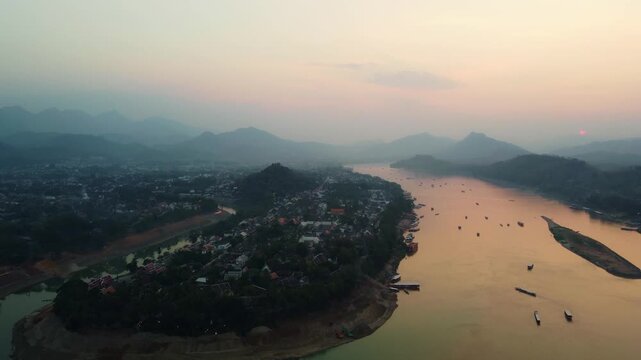 Aerial view Sunset in luang prabang city drone footage.