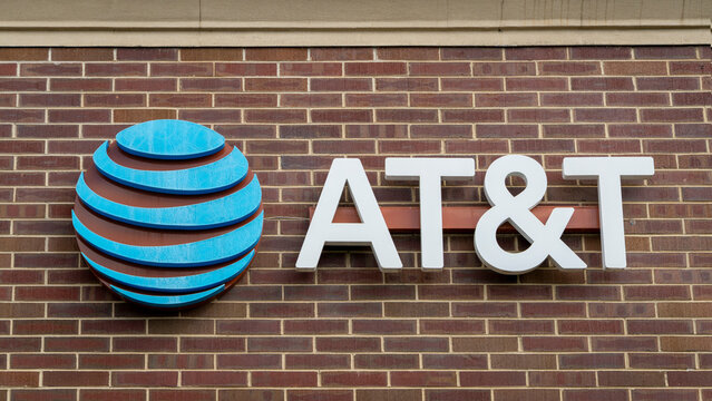 Fort Collins, CO, USA - August 25, 2026: AT&T sign and logo on the facade of a retail store in Fort Collins, Colorado. Telecommunications, wireless and mobile technology company.