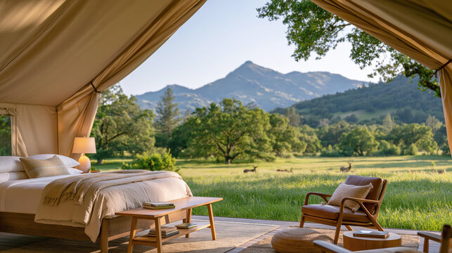Luxurious Tent Interior Overlooking Scenic Mountain Landscape at Sunrise