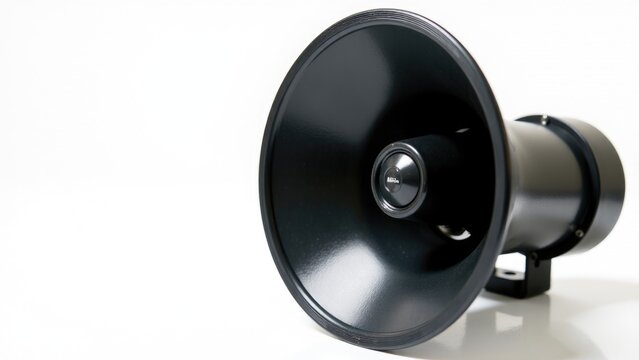 A close up of a speaker on a white surface, suitable for use in presentations, tutorials, and product demos