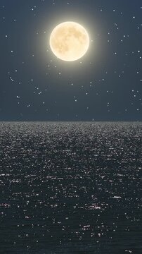 Full moon shining over calm ocean water with starry night sky