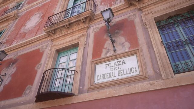 View of sign on Episcopal Palace of Murcia in Placa del Cardenal Belluga on a sunny day, Murcia, Murcia Region, Spain