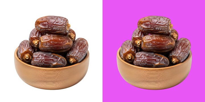 Fresh sweet dried dates in wooden bowl