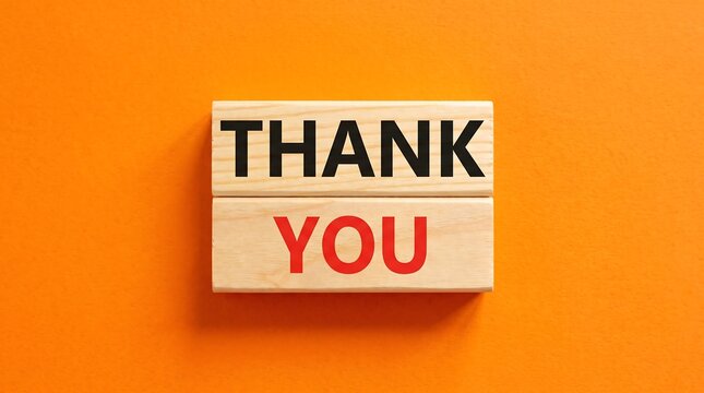 Thank you message on wooden blocks, gratitude text on orange background, appreciation concept for business and customer service