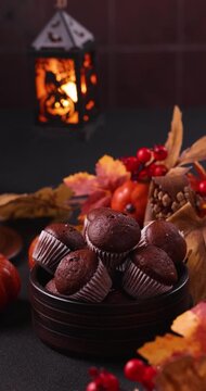 Halloween chocolate muffins with spooky lantern decoration