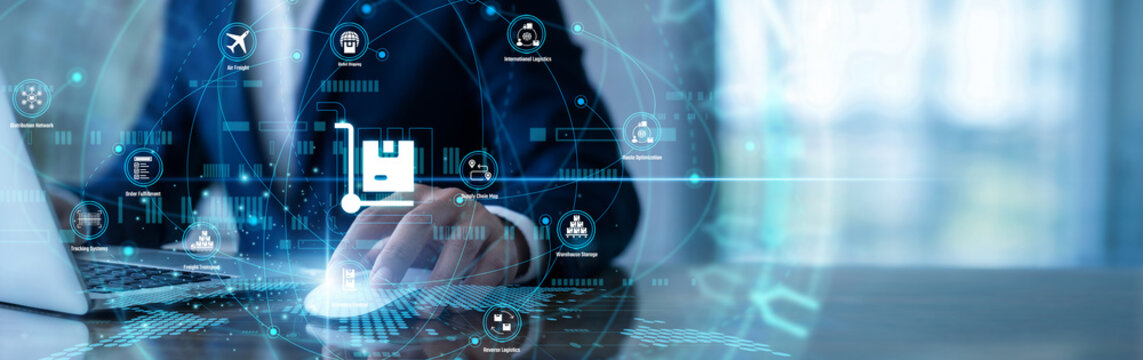 Manager working on laptop using Logistics network systems to track shipment deliveries globally. Coordinating supply chain routes and optimizing inventory transit times to ensure timely arrival.