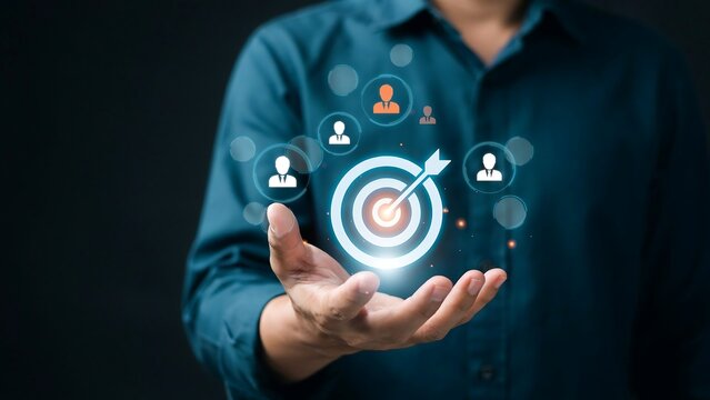 Business Target and Team Management Concept with Businessman Holding Virtual Target Icon